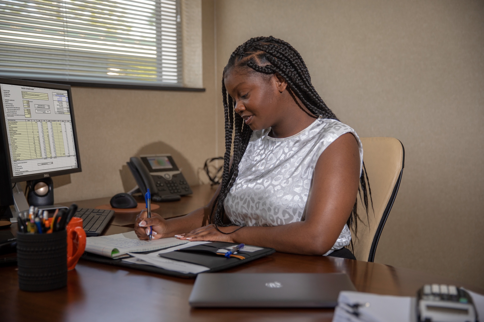 woman works at desk