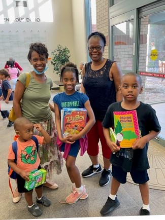 Family at an event in the Conference Center Atrium