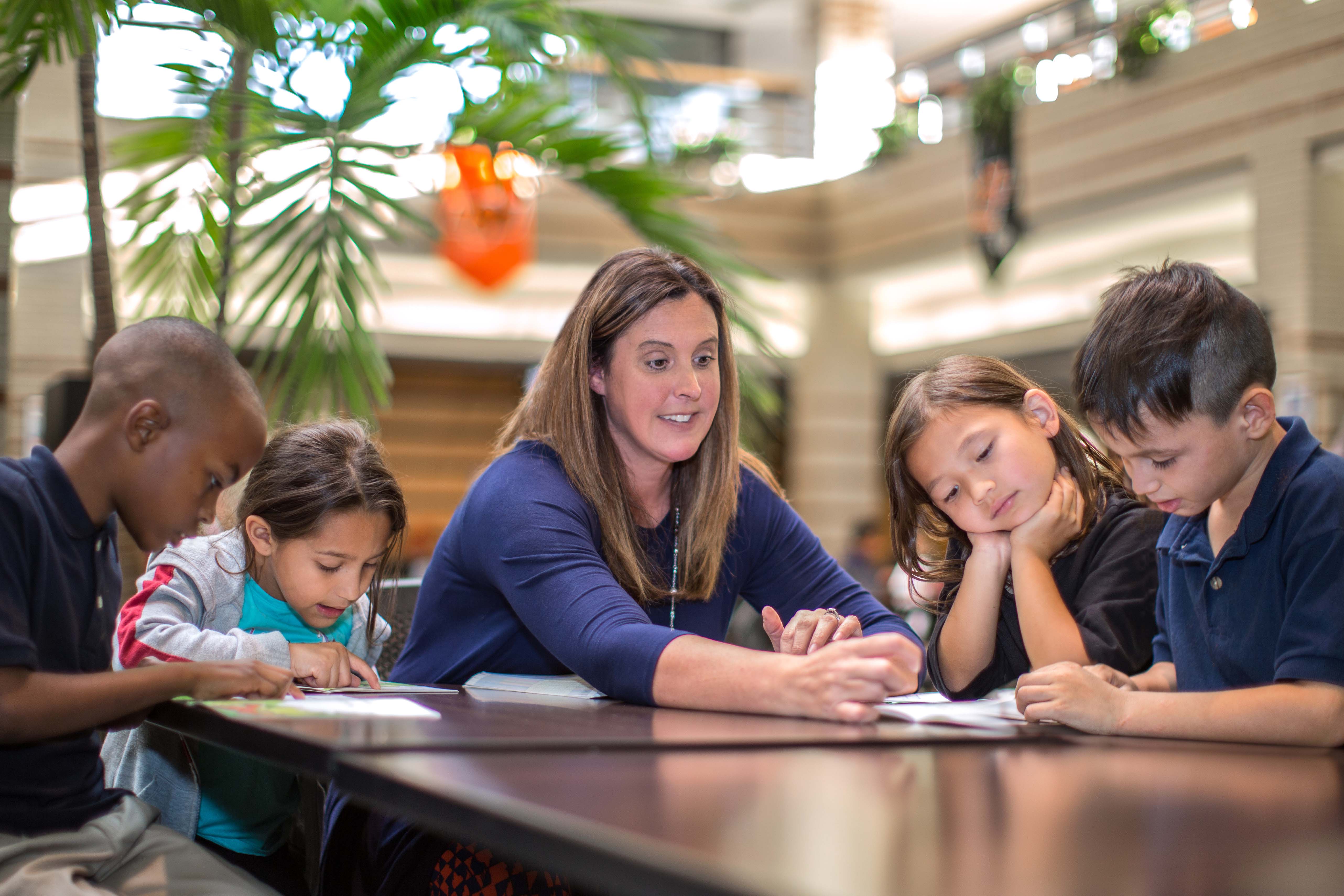 Woman working with children